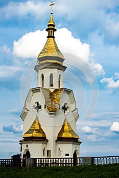 Artistic, gold laden tower of orthodox church style in Kiev, Ukraine. photo